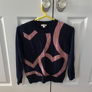 Blue sweater with pink hearts